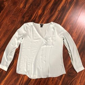 Long sleeve ruffle front blouse